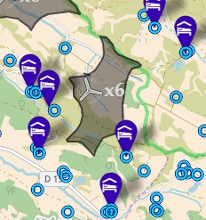 Habitations (cercles) et chambres d’hôtes (marqueurs) directement exposés à l’un des sites éoliens souhaités par les promoteurs